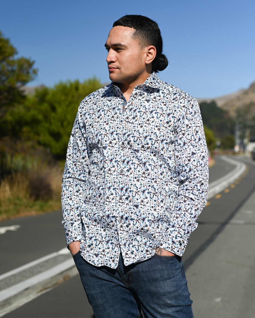 Young Samoan man wearing a long-sleeve shirt by Di Nero
