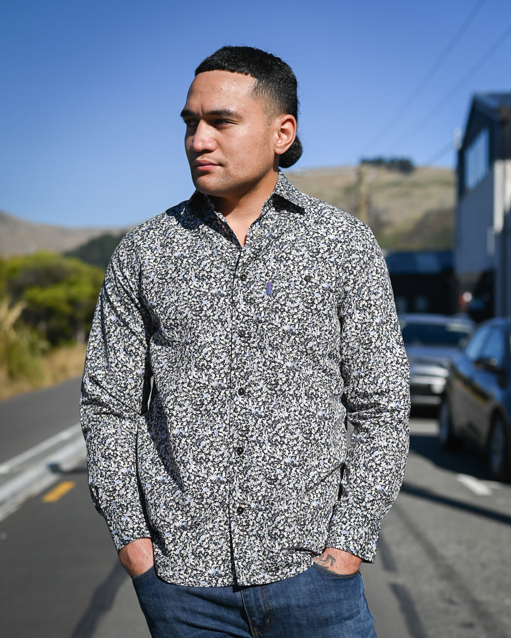 Young Samoan man wearing a long sleeve shirt made out of wood pulp fabric