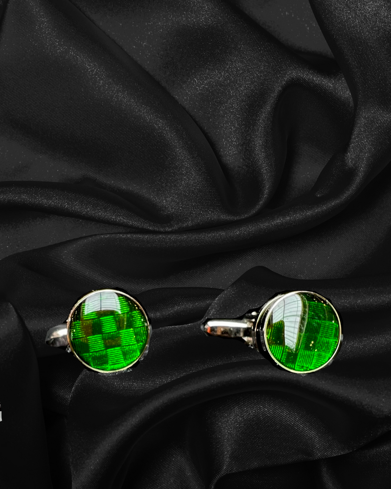 Round green glass cufflinks with chrome edging