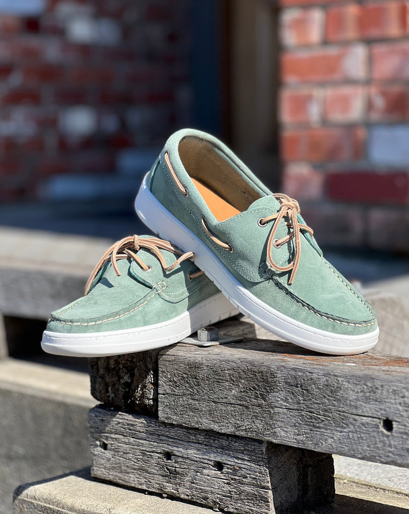 Green suede boat shoes