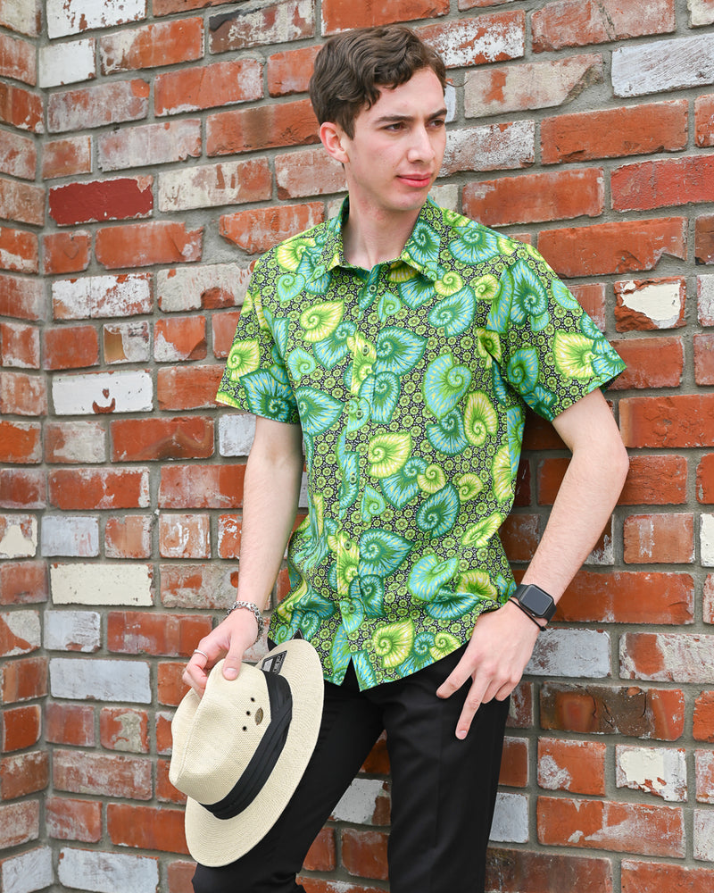 Man wearing a short-sleeve cotton foliage print shirt by Mr Peacock made in NZ