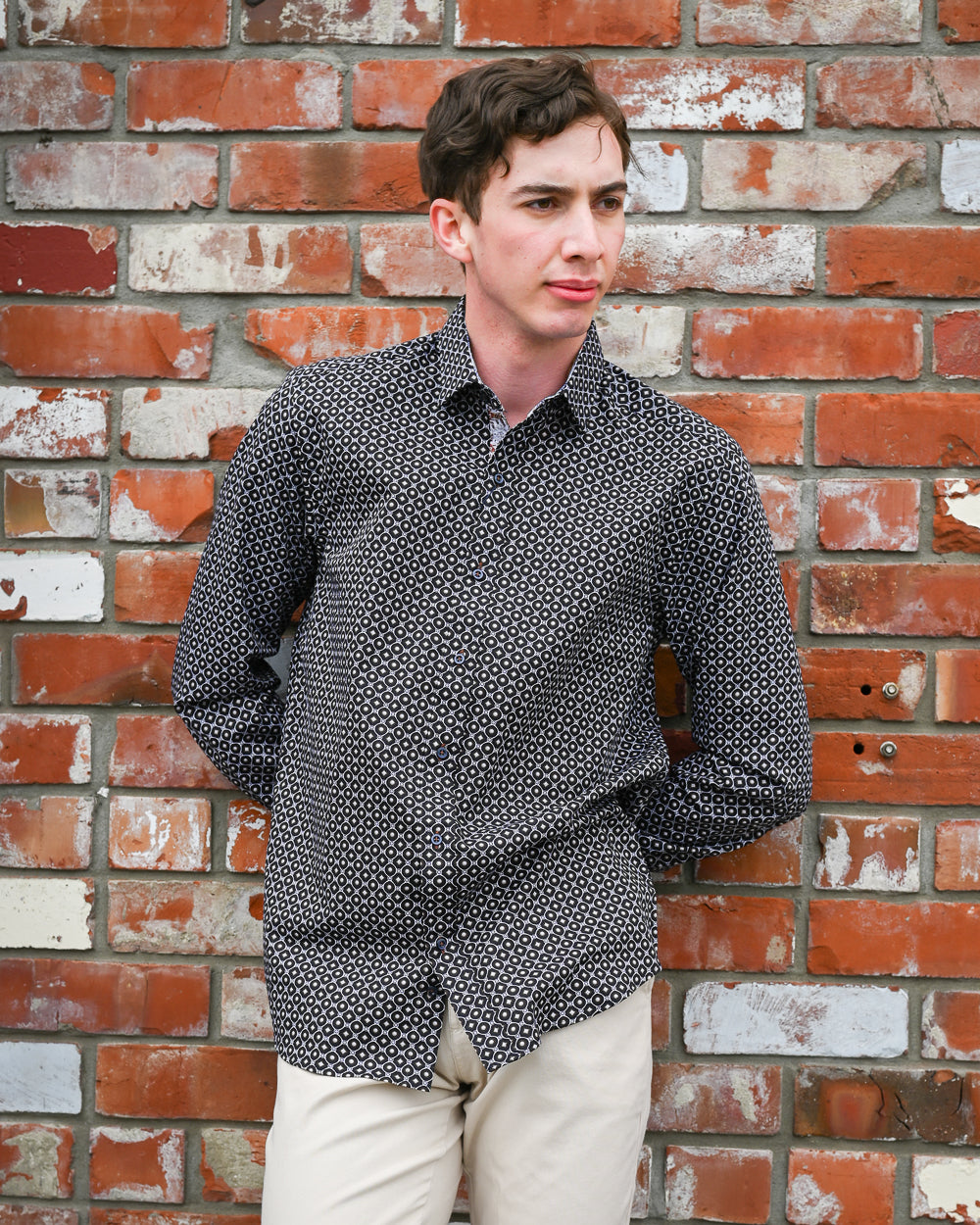 Man wearing a patterned long-sleeve shirt by Franco Negretti