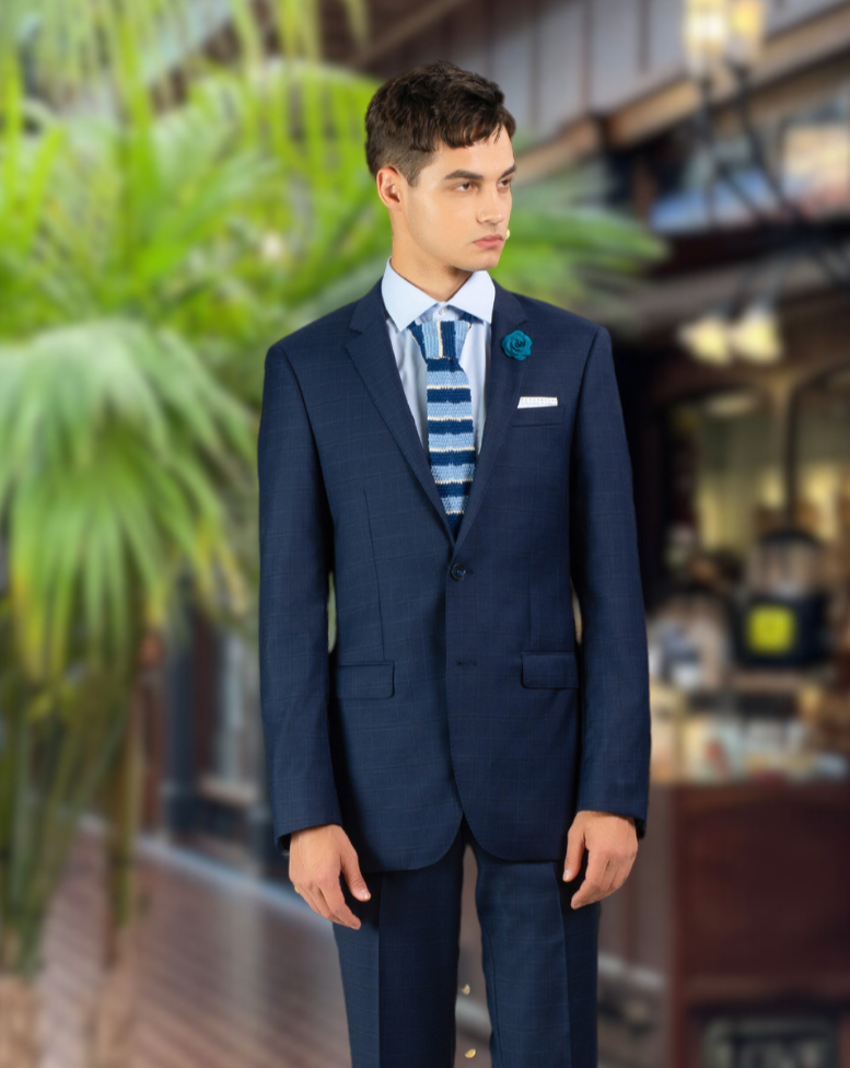 Young man wearing stylish navy blue merino wool suit by Savile Row 