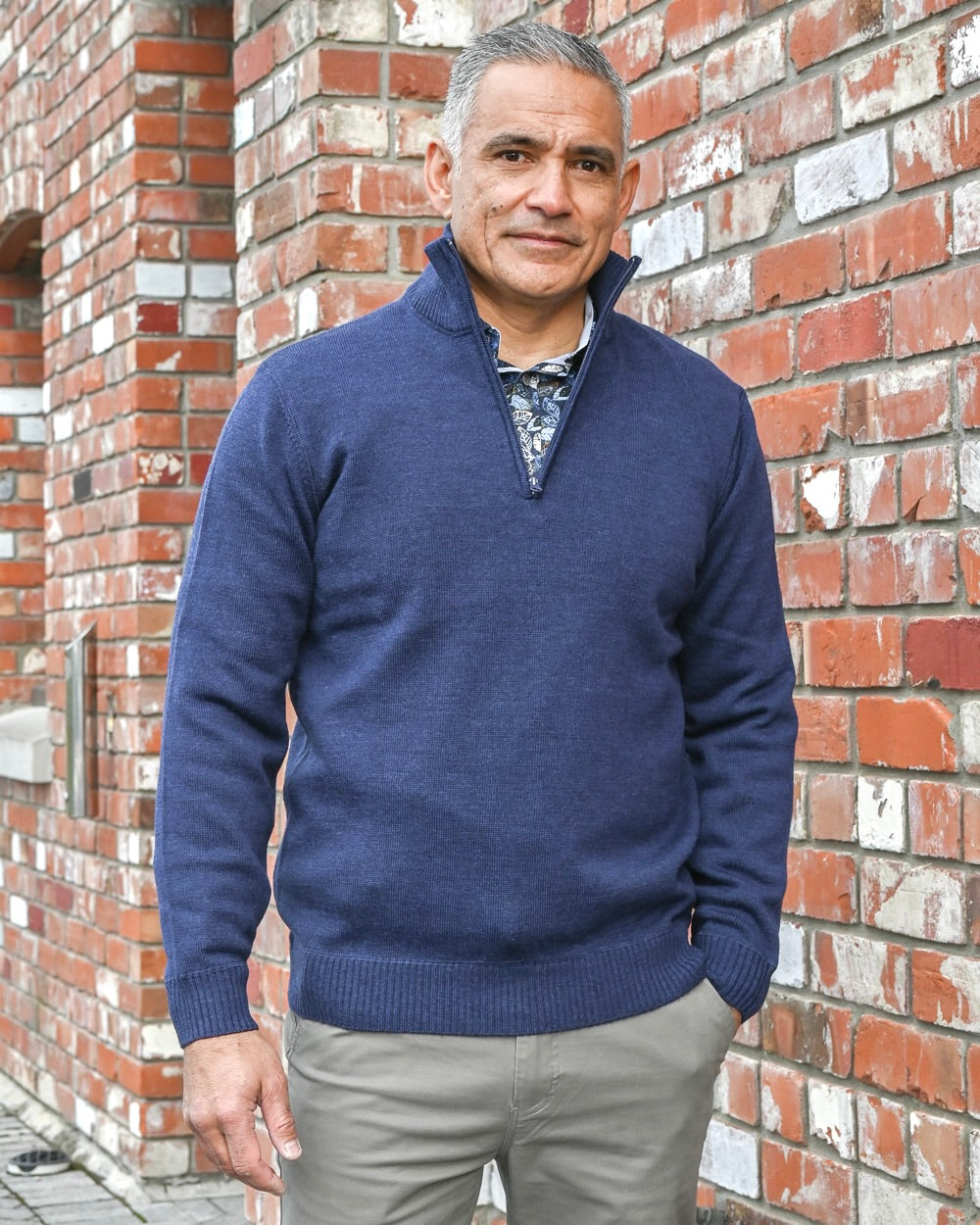 Man wearing stylish zip-neck pure wool jumper by Silverdale