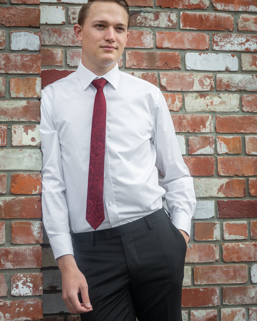 A Plain Collar Slim-fit white shirt made from a soft easy care fabric -and featuring a placket front a plain cuff, a darted back and a back yoke with double french cuffs