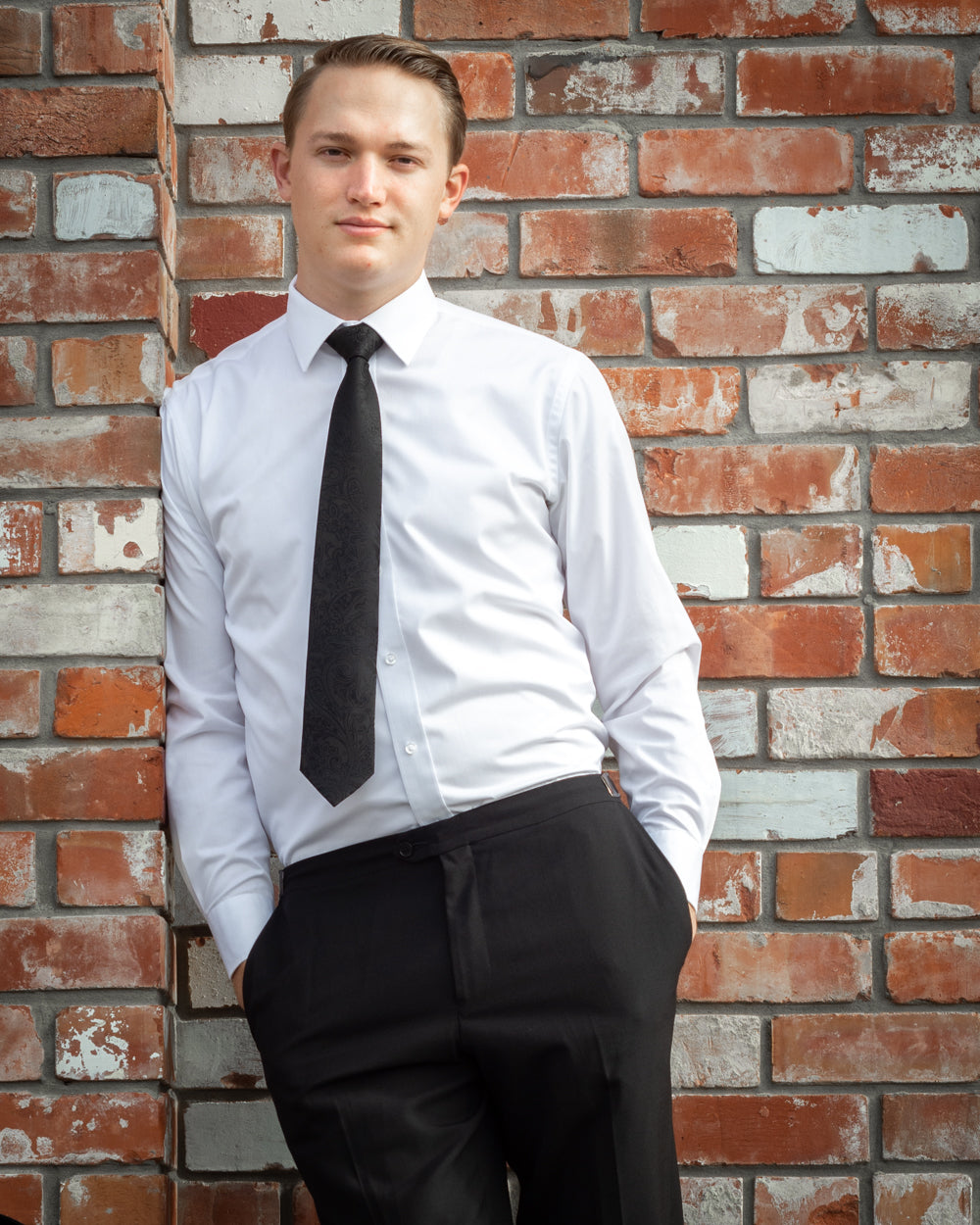 A White plain Collar Slim-fit shirt made from a soft easy care fabric and featuring a placket front a plain cuff, a darted back and a back yoke.