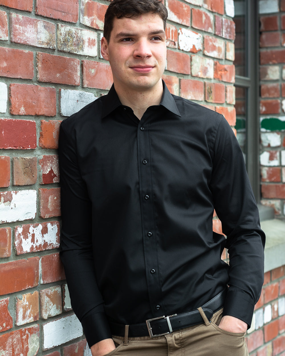 Black shirt by Boston with single-cuffs and plain collar