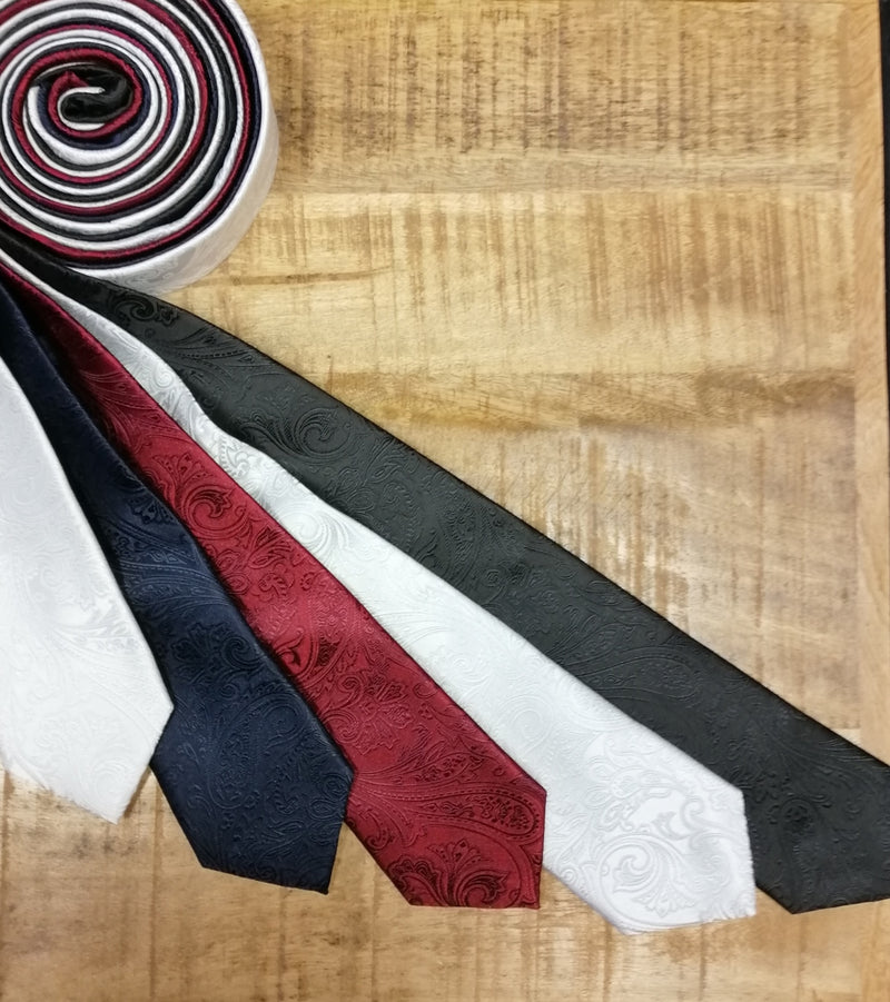 Five satin paisley ties in white, navy, crimson, white, and black