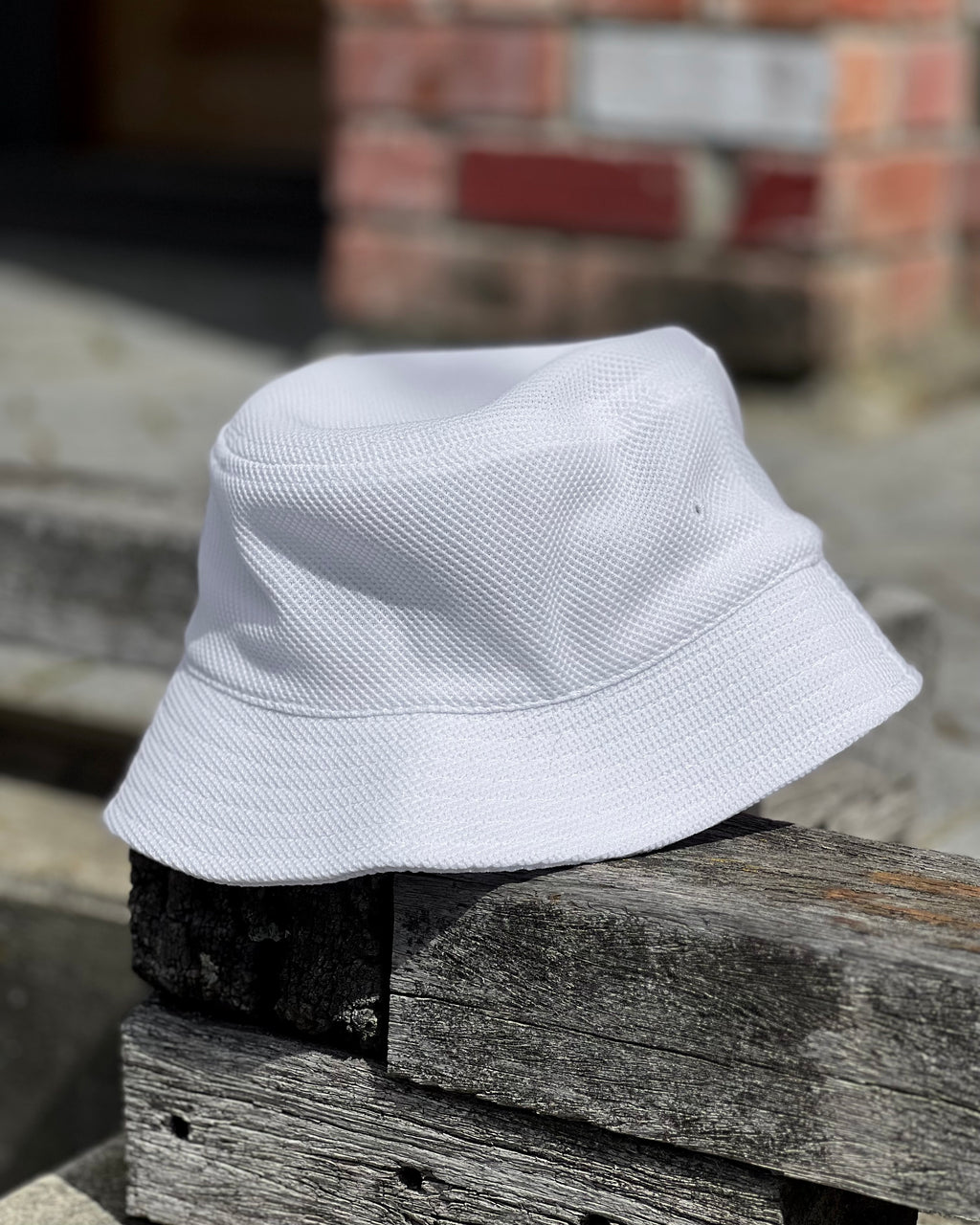 White bucket hat