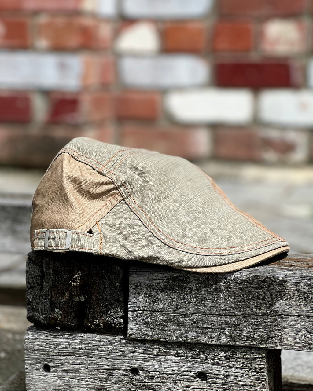 Retro style cheese cutter cap in light brown with patch stitching