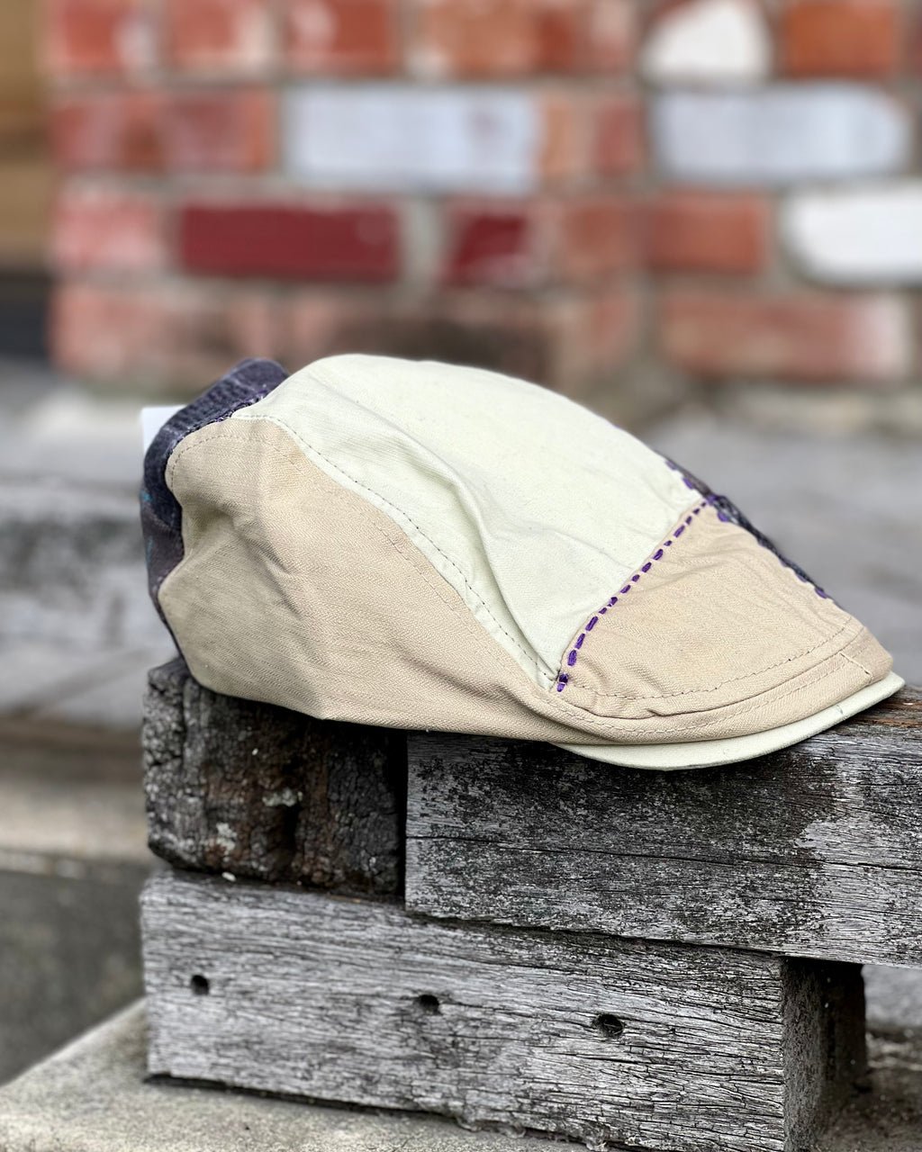 Cheesecutter cap with patched stitching in wool and cotton by Electric Pukeko