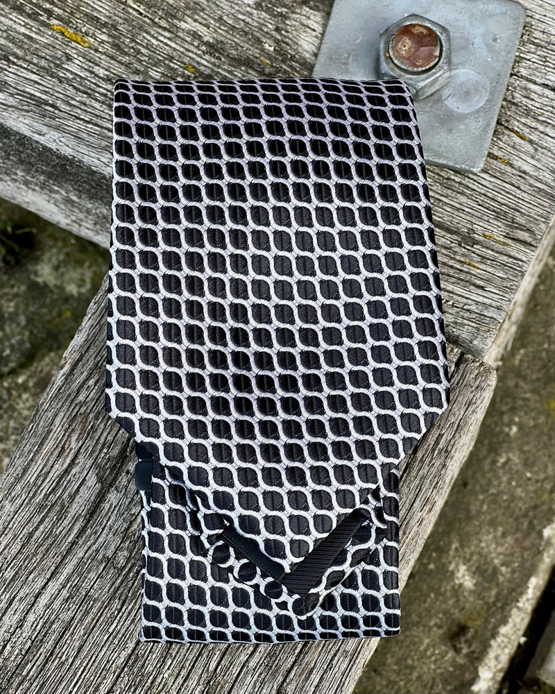 Black and silver tie by the tie company - polyester