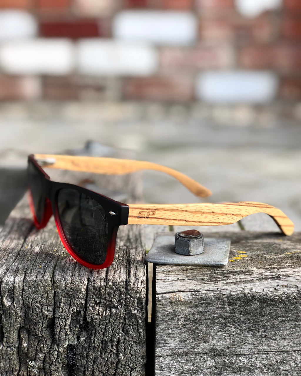 Electric Pukeko Sunglasses - Gradient Black to Red Frames with Zebrano Wood Arms