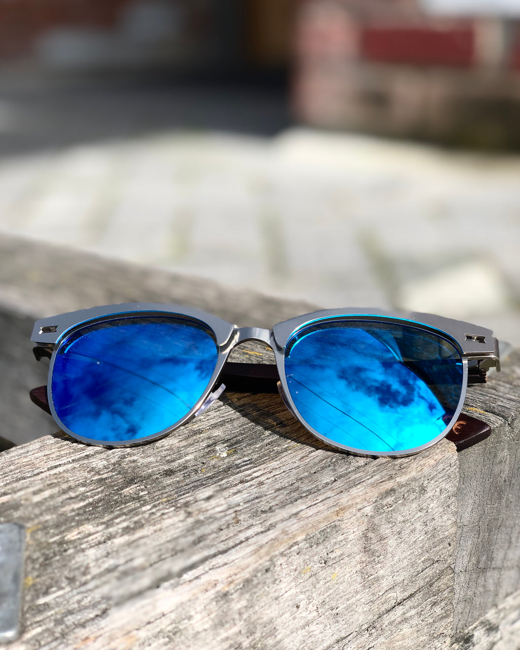 Electric Pukeko Sunglasses - Silver Frames with Ice Mirror Polarised Lenses & Dark Wood Arms