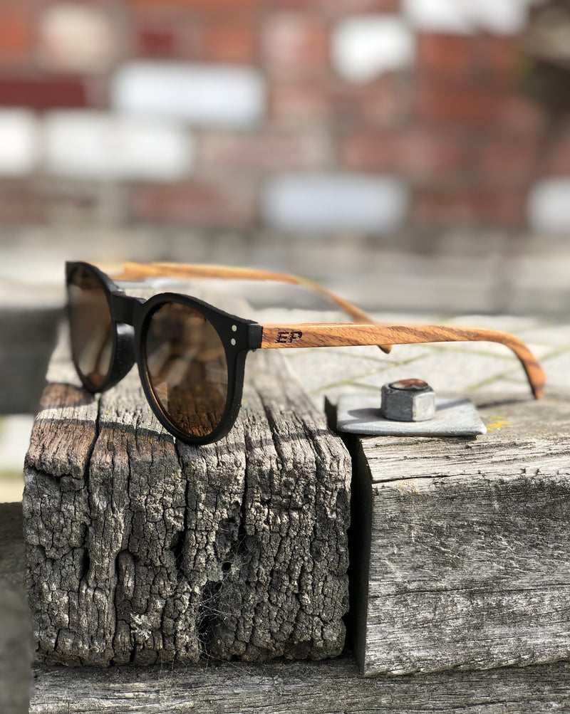 Electric Pukeko Sunglasses - Round Black Matt Frame with Orange Lenses & Zebrano Wood Arms